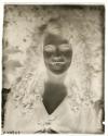 [Curly-haired woman, possibly Osa Johnson]