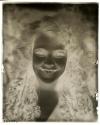 [Smiling woman, likely Osa Johnson]