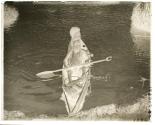 Girls in native canoe