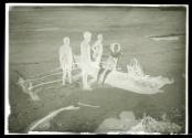 Mrs. Martin Johnson and Natives on the Beach