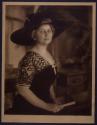 [Woman in hat]