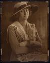 [Woman with crossed arms]