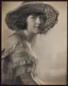 [Woman in hat]