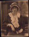 [Portrait of a woman holding cigarette case (?)]