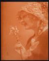 [Woman holding flowers]