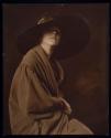 [Woman in big hat]