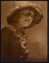 [Woman in hat]