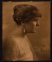 [Woman in profile]