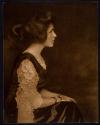 [Seated woman in profile]