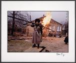 A Chechnyan soldier prepares to pray while Russian forces shell Grozny. Grozny, Chechnya, Russia