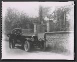 [Nickolas Muray, man, and chauffeur with Bentley automobile at gates of Claude Monet's Giverny Estate]