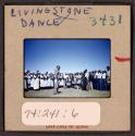 [Group of people watching dancer, Livingstone, Zambia (travel slide)]