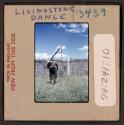 [Person in traditional clothing and mask, Livingstone, Zambia (travel slide)]