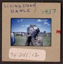 [Person in traditional clothing and mask, Livingstone, Zambia (travel slide)]