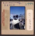 [Person in tradtional clothing and mask, Livingstone, Zambia (travel slide)]