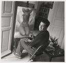 [Miguel Covarrubias seated at easel]