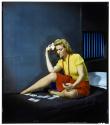 [Woman in cell, playing solitaire]
