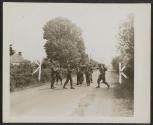 [A few of the many German prisoners that surrendered willingly to American infantrymen in fighting that took place near Cherre, France.]