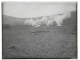 [Battlefield with smoke]