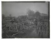 [Soldiers repairing damaged bridge]