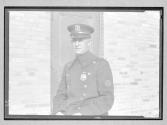 [Portrait of Policeman Badge # 10086]