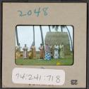 [Hula dancer and musicians, Hawaii (travel slide)]