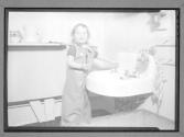 [Child Playing in Sink]