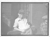 [Two Boys by Window]