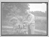 [Boy with Fern]