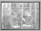 [Two Boys with Pulleys]