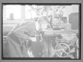 [Boy using Machine/Shop Class]