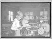 [Children in Shop Class]