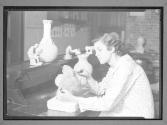 [Woman With Pottery]