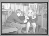 [Boy and Girl with Skunk]