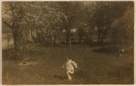 [Young Kate Steichen in the garden at Voulangis, France]