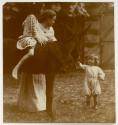 [Clara with daughters Mary and Kate and the pet Donkey at Voulangis, France]