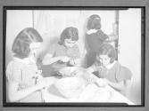 [Girls Slicing Vegetables]