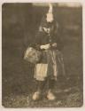 [Young Kate Steichen with Basket and Feathered Hat]