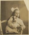 [Kate Steichen with a dog]