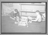 [Two Boys with Blocks]