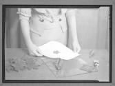 [Woman Printing, Leaf Relief]