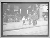 Candid Shot Of Newsie 1912/Newsie Selling Papers On street