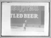 Little Newsboy In Front Of Saloon 1910/Young Newsie