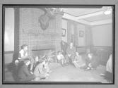 [Boys Around Fireplace]