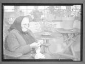 [Old Woman Crocheting]