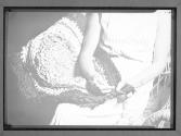 [Woman Hooking Rug]