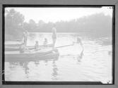 [Campers, Swimming by Dock]