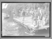 [Boys Swimming by Dock]