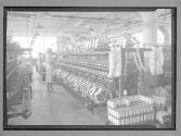 [Women at Looms]