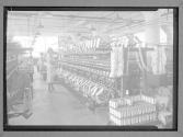 [Woman with Spools]